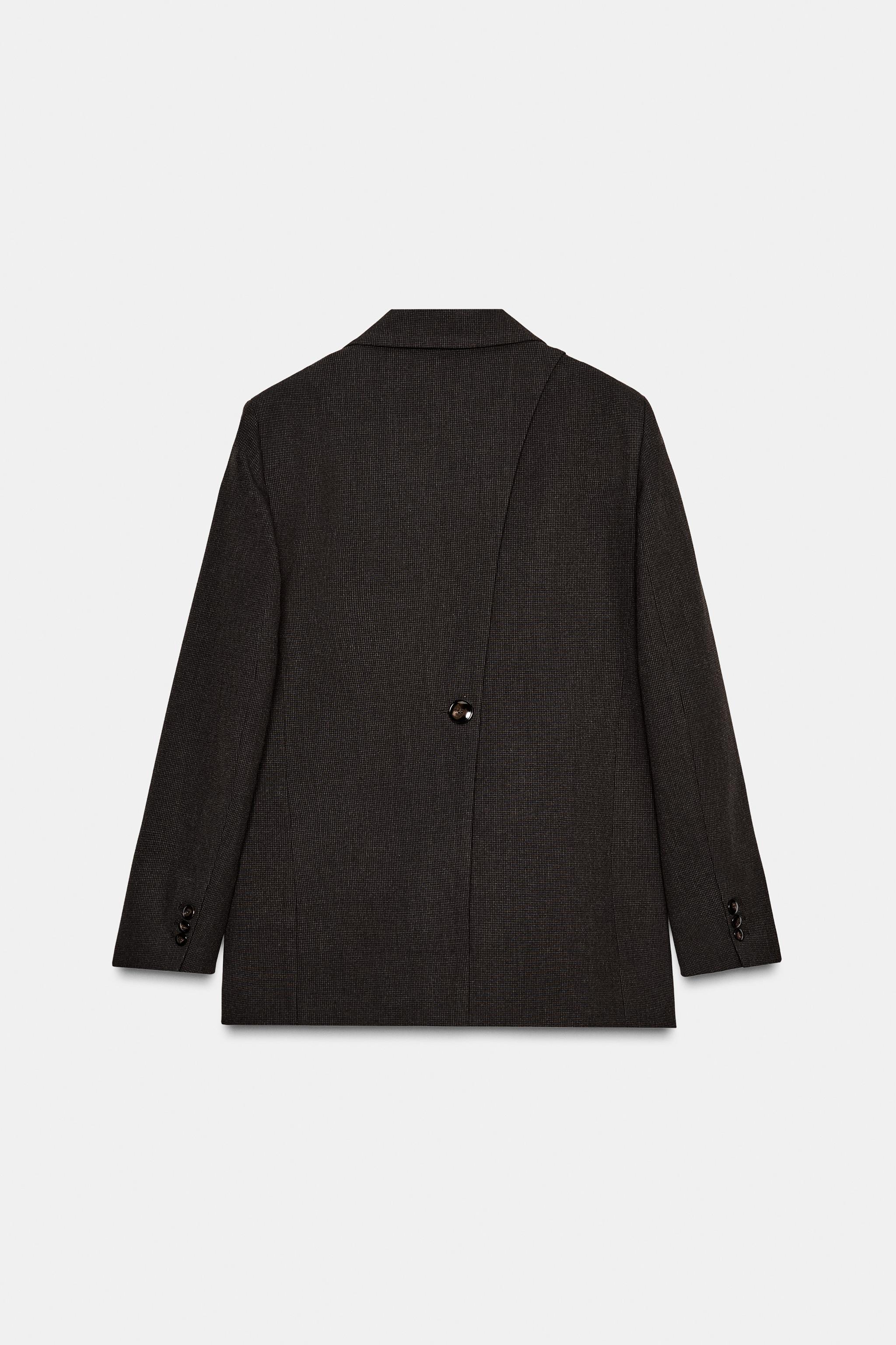 BLAZER WITH SHOULDER PADS AND BUTTONED BACK